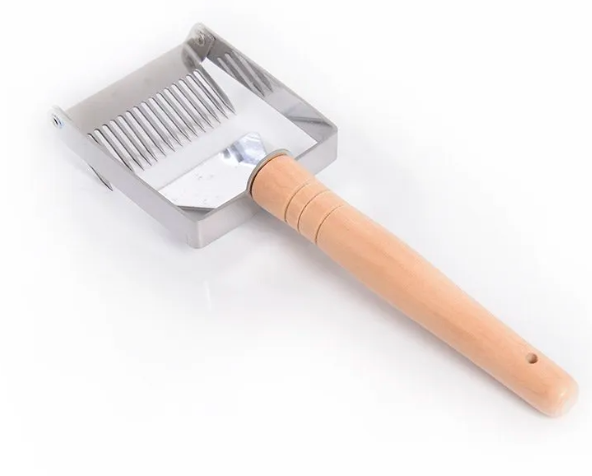 Uncapping fork with wooden handle
